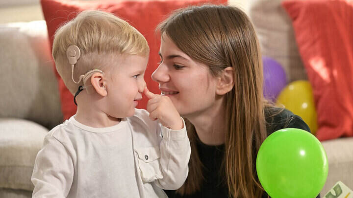 IMAGE OF SPEECH THERAPY FOR CHILDREN WITH HEARING LOSS